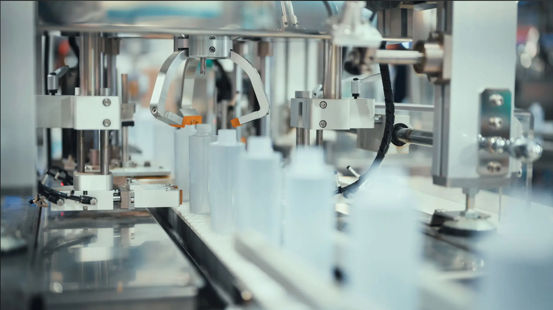Automated manufacturing line handling bottles